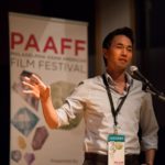A filmmaker speaking to the audience at PAAFF 2014