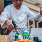 Chef Joseph Poon flambeing his dish at PAAFF Asian Chef Experience 2016