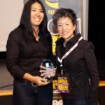 Bertha Bay-Sa Pan holding her trophy for Emerging Filmmaker with Susan Jin Davis at PAAFF 2011