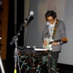 Jason Min Playing guitar at PAAFF 2011