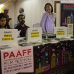 KhanMy Vuong, Aneel Saleem, and Selena Yip at the Check-in Table at the 2018 PAAFF Preview Party