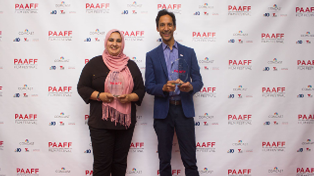 Tiger Hunter Filmmakers holding their trophies for Best Narrative Feature at PAAFF 2016