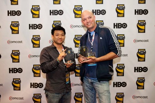 Harry Kim and Stephane Gauger holding their trophies at PAAFF 2011