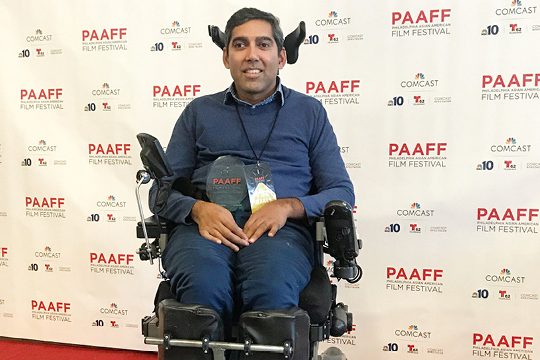 Jason Da Silva with his trophy for the Vijay Mohan Social Change Award at PAAFF 2019